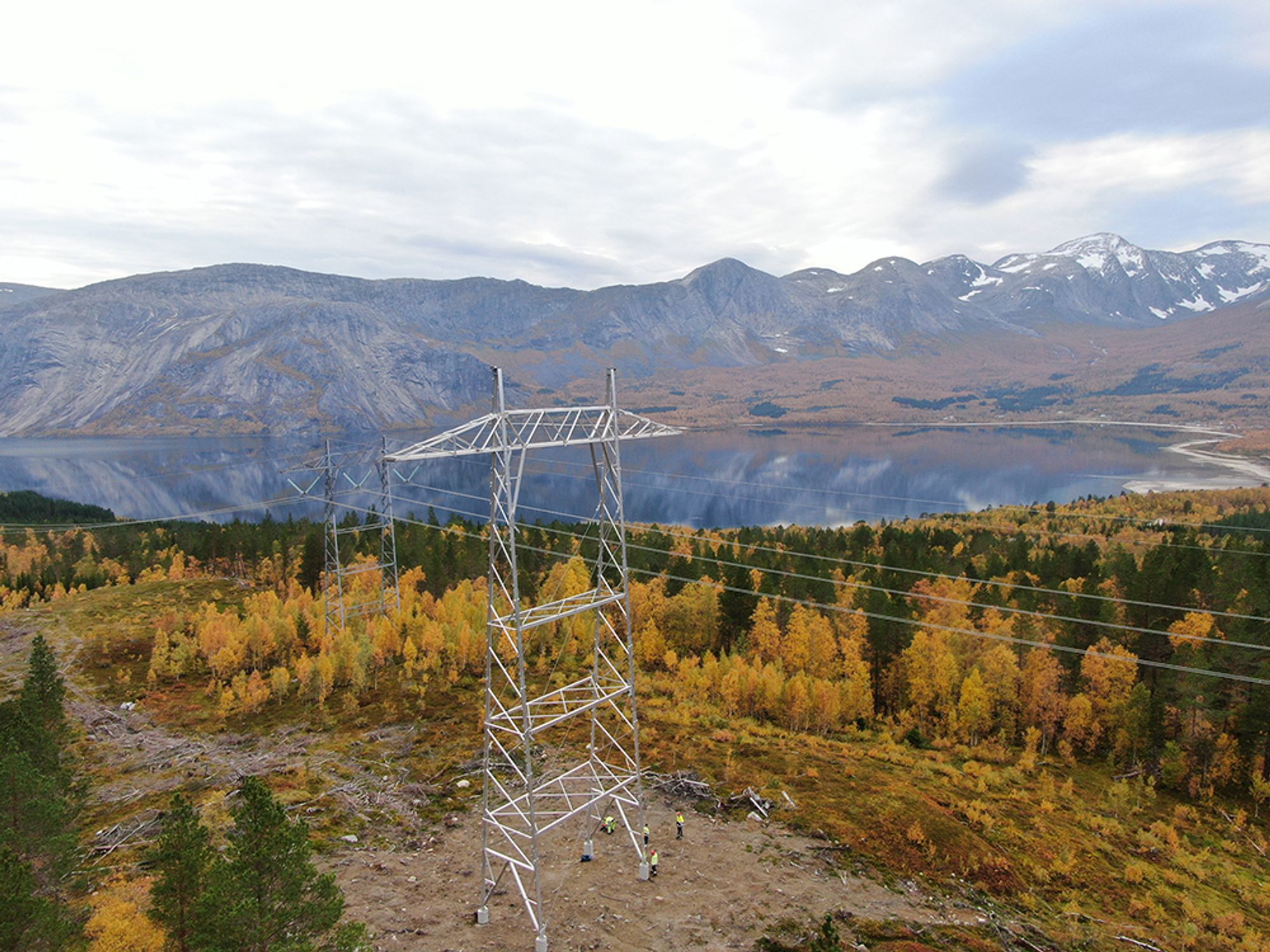 A tower is set in a rough terrain environment.